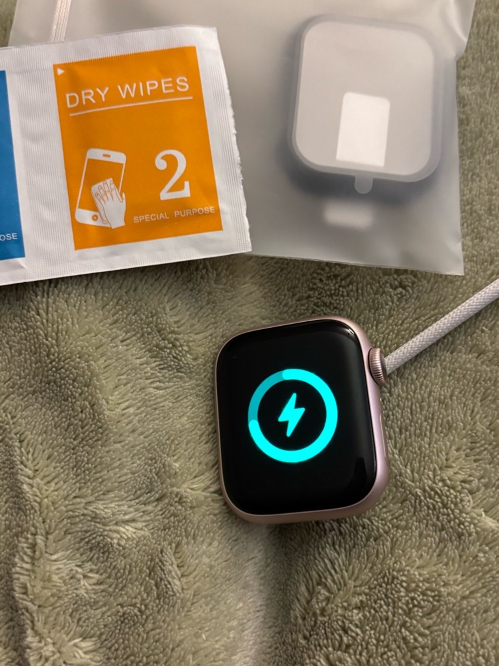 Apple Watch Series 9, 41mm with charger and unused case.